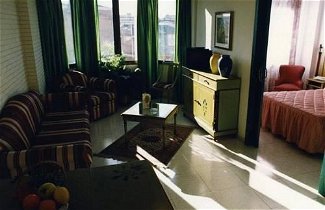 Photo 1 - Camparan Suites